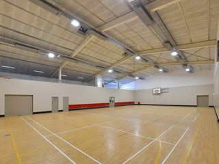 Sport Hall - towards roller storage door, kitchen access doors, entry doors