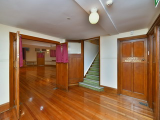 Main Hall - old front foyer, stairs to mezzanine